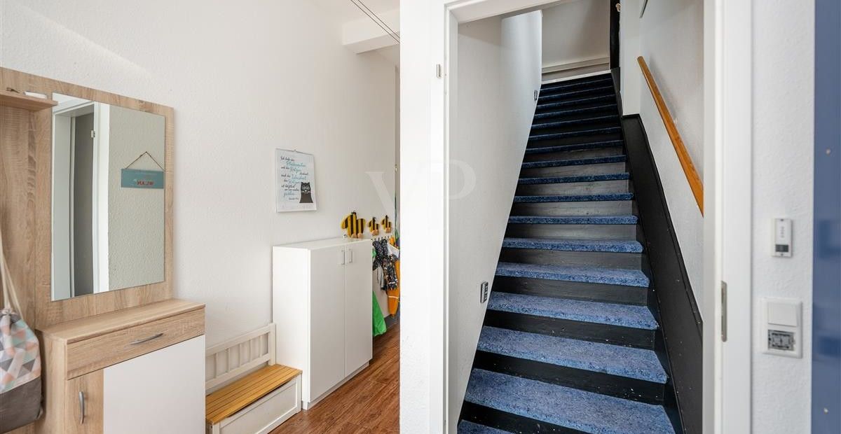 Treppenaufgang zur Dachgeschoss Wohnung