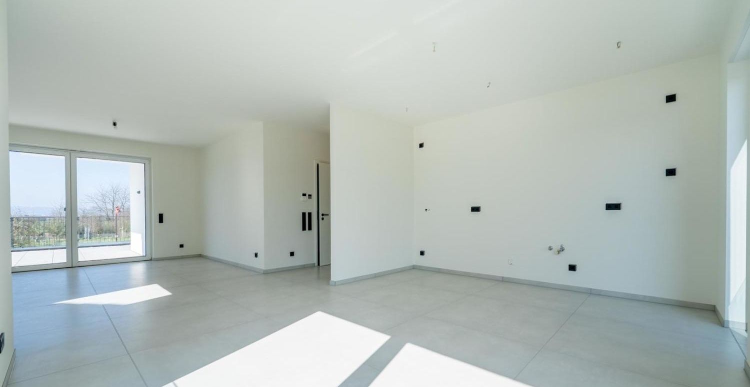 Offener Kochbereich mit Wohnzimmer