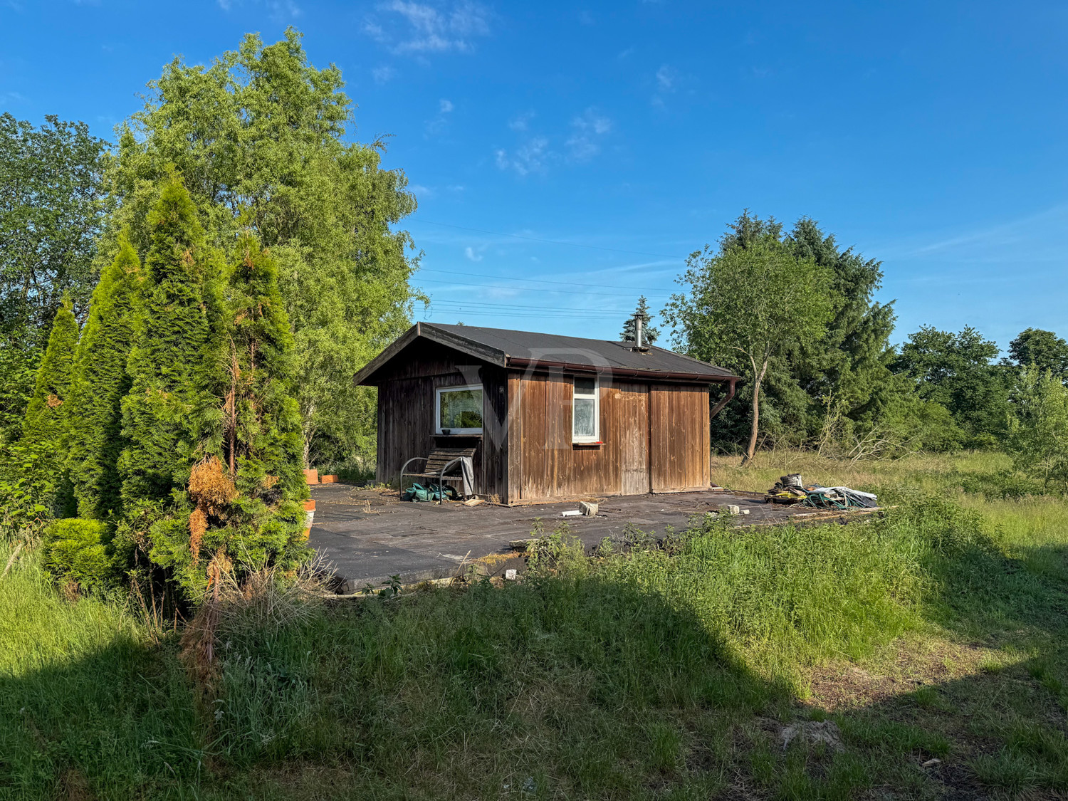Holzhütte als Kellerabdeckung