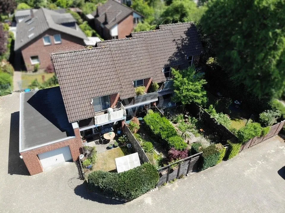 Joli ensemble de maisons mitoyennes comprenant quatre unités résidentielles