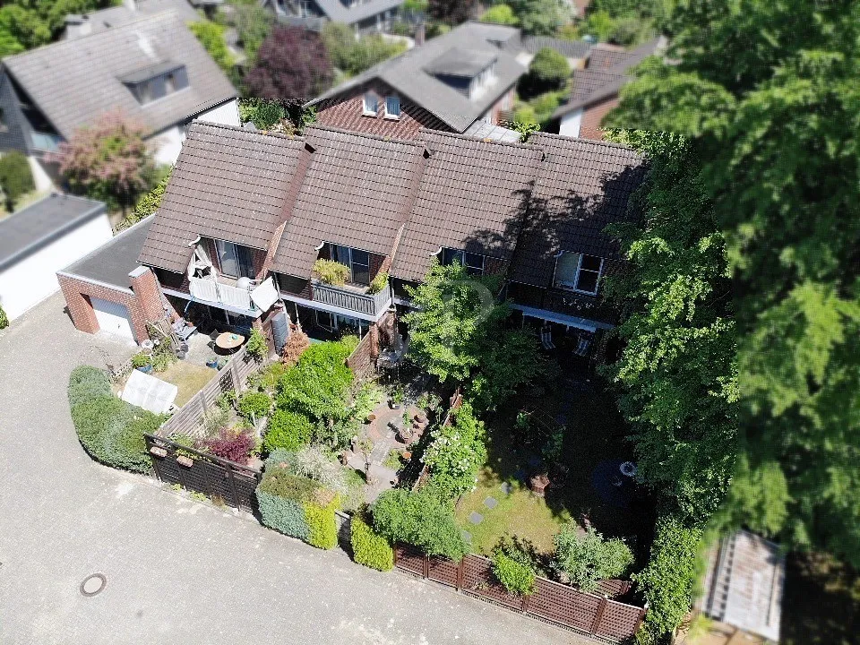 Joli ensemble de maisons mitoyennes comprenant quatre unités résidentielles