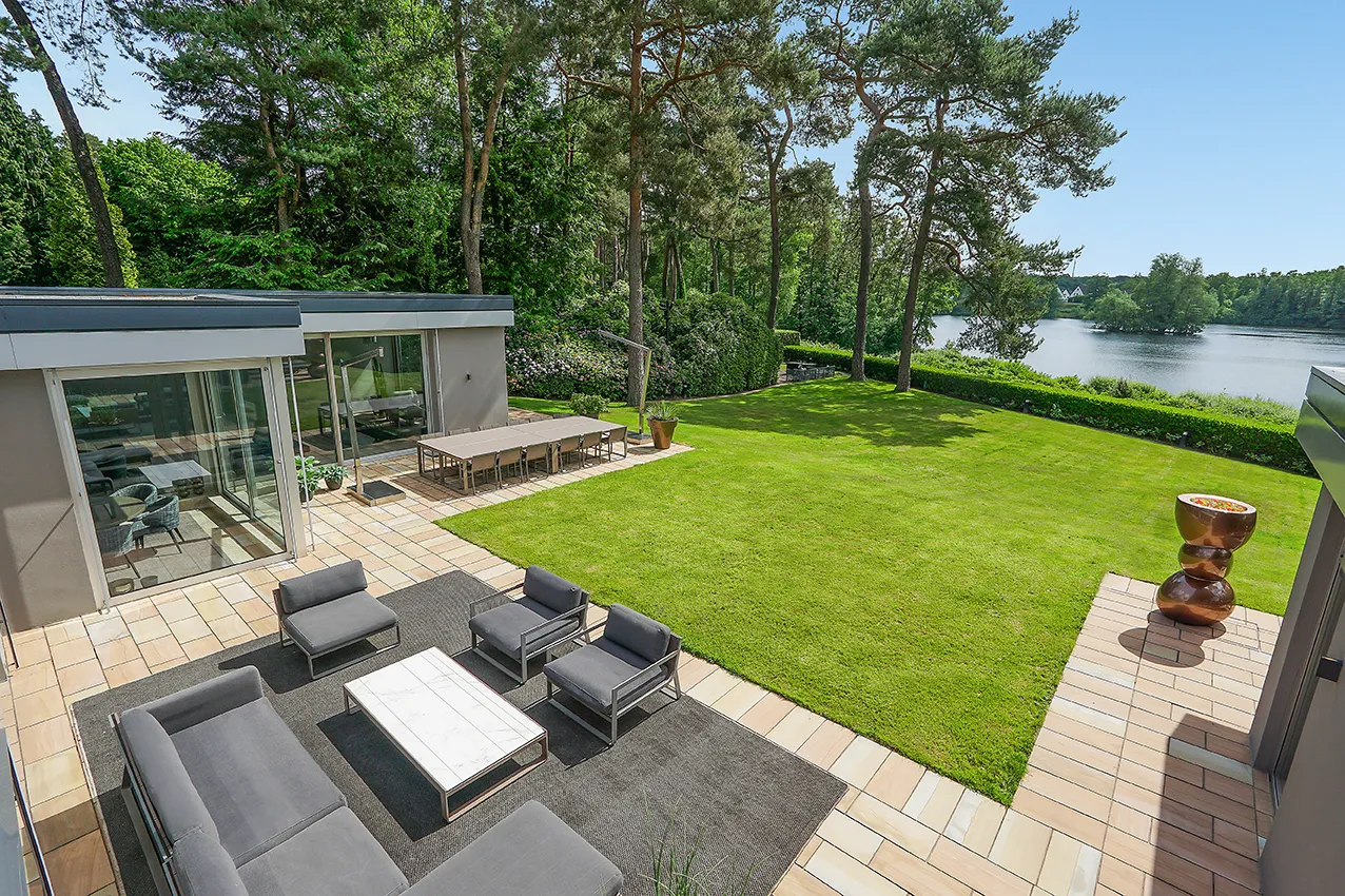Exclusive designer luxury bungalow with high-end amenities on a unique lakeside property