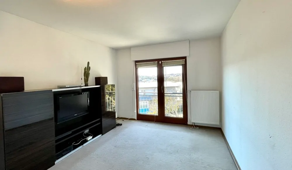 Schlafzimmer Eltern mit bodentiefen Fenster mit französischen Balkon OG