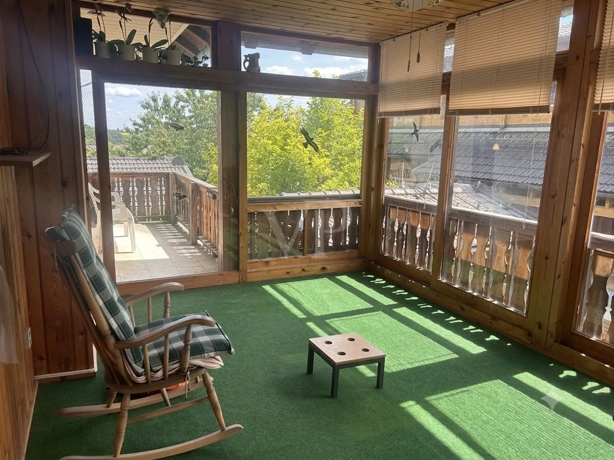 Verglaste Pergola mit anschließendem Balkon