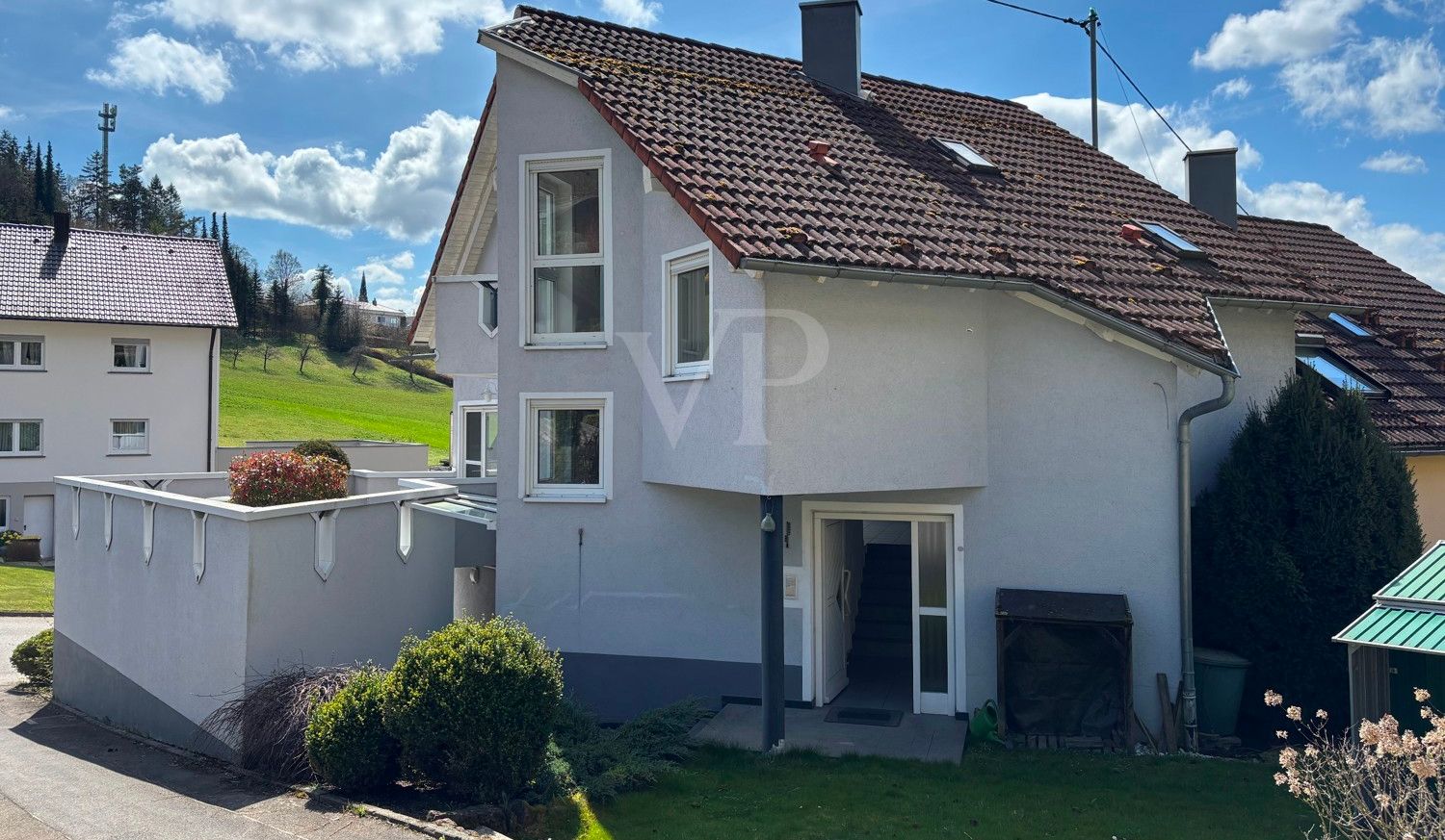 Doppelhaushälfte mit Einliegerwohnung, Garage und Dachterrasse