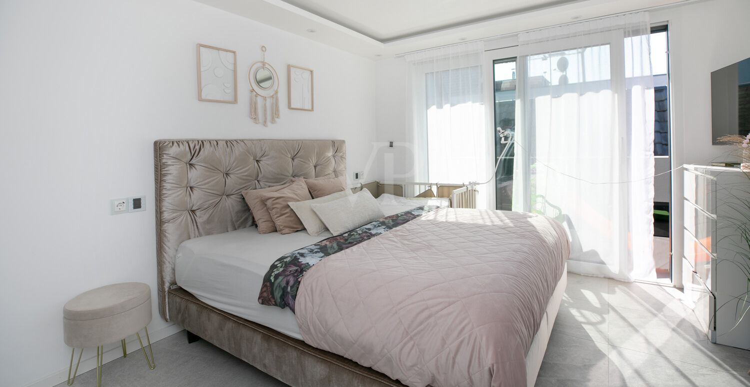 Schlafzimmer  mit Badezimmer en suite