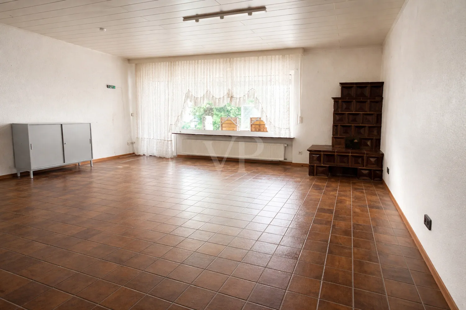 Wohnzimmer mit Kachelofen