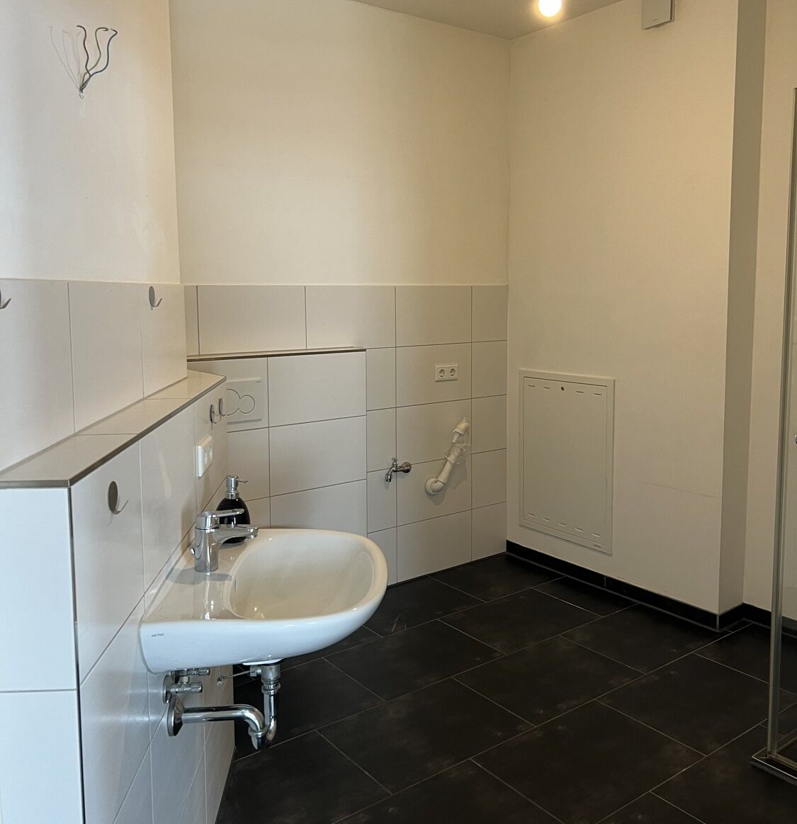 Badezimmer mit Waschmaschinenanschluss