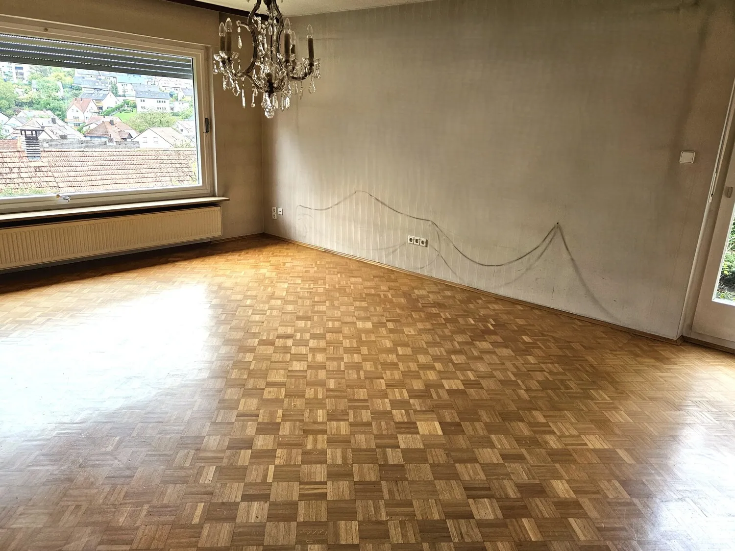 Wohnzimmer mit Zugang zur Terrasse