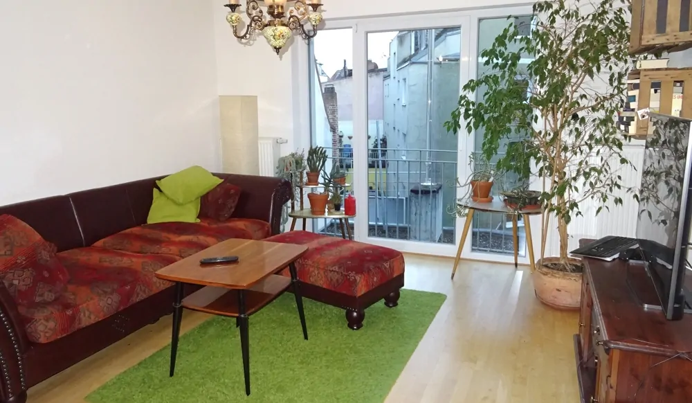 Wohnzimmer mit französischem Balkon