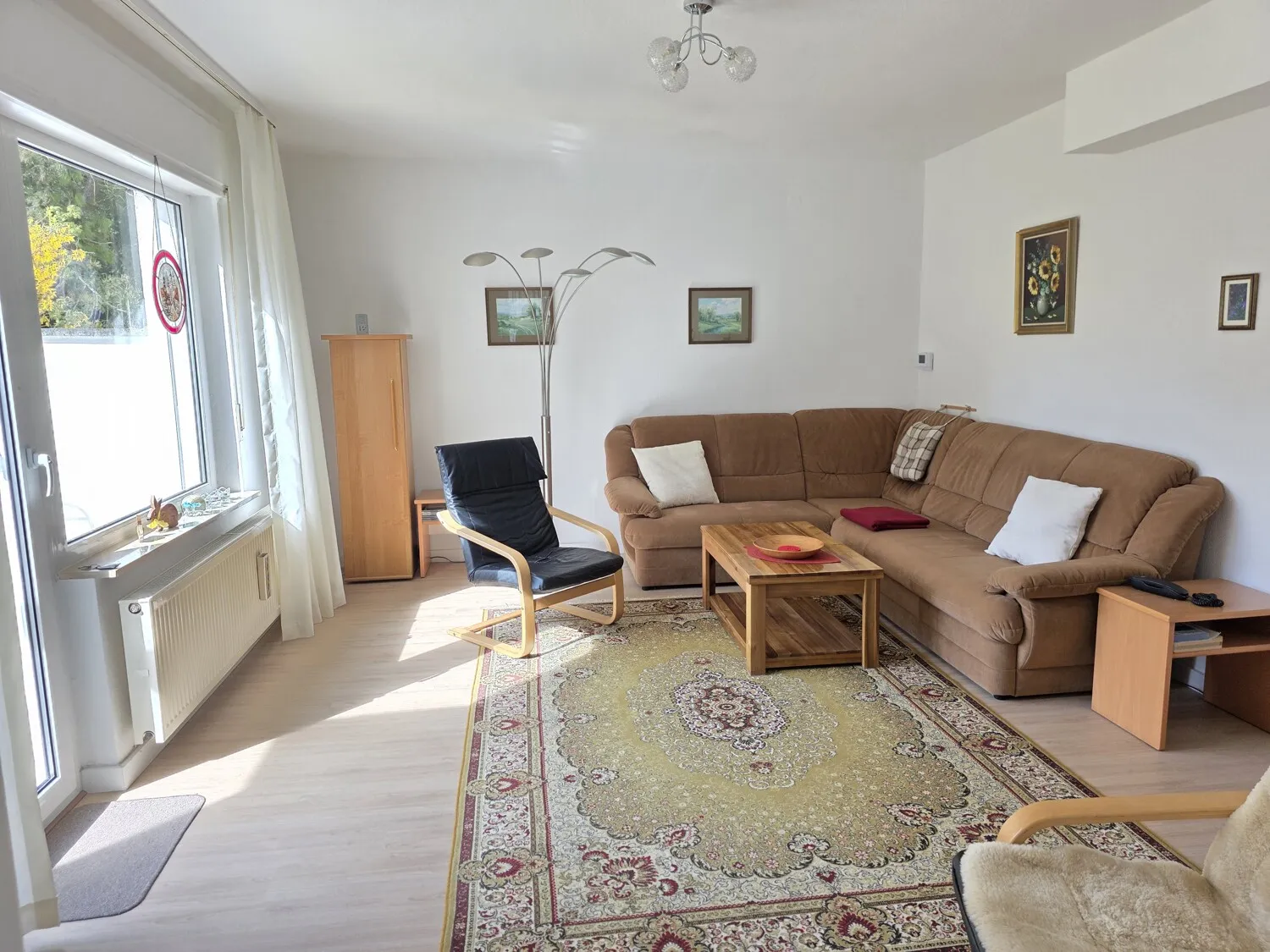 EG Wohnzimmer mit Kachelofen, Terrassen- und Gartenzugang (1)_#111242