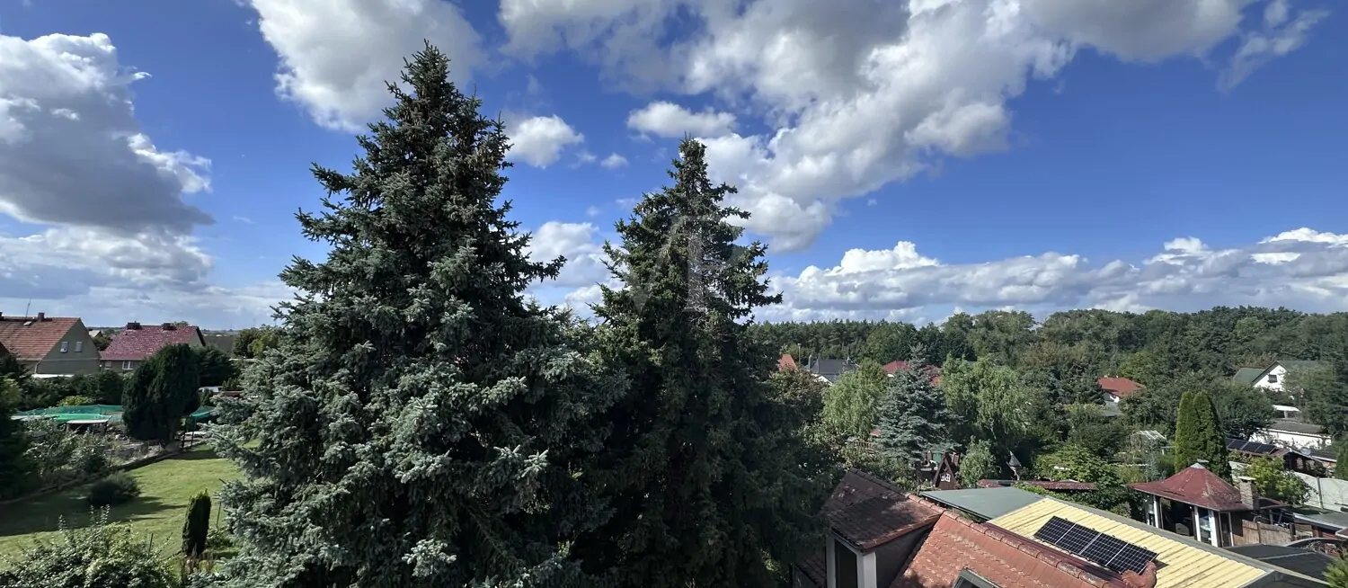 Charmante Doppelhaushälfte mit großzügigem Garten und ausgebautem Dachgeschoss