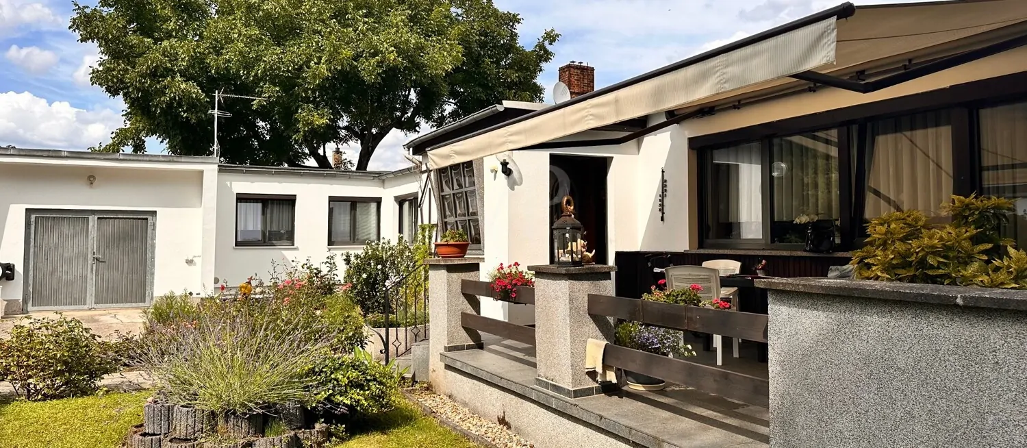 Charmantes Raumgefühl mit sonnigem Garten in gepflegter Doppelhaushälfte