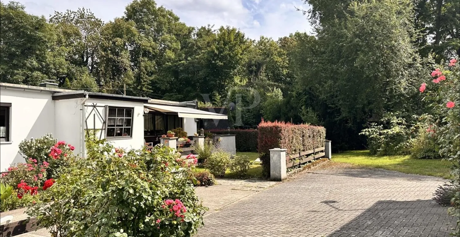 Charmantes Raumgefühl mit sonnigem Garten in gepflegter Doppelhaushälfte