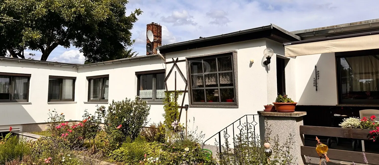 Charmantes Raumgefühl mit sonnigem Garten in gepflegter Doppelhaushälfte