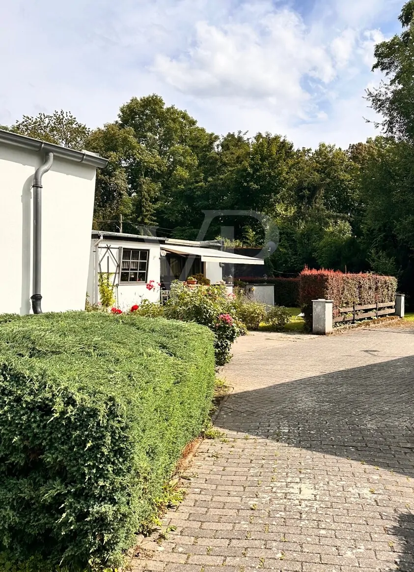 Charmantes Raumgefühl mit sonnigem Garten in gepflegter Doppelhaushälfte