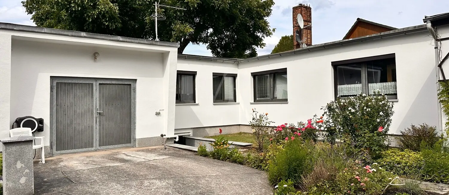 Charmantes Raumgefühl mit sonnigem Garten in gepflegter Doppelhaushälfte