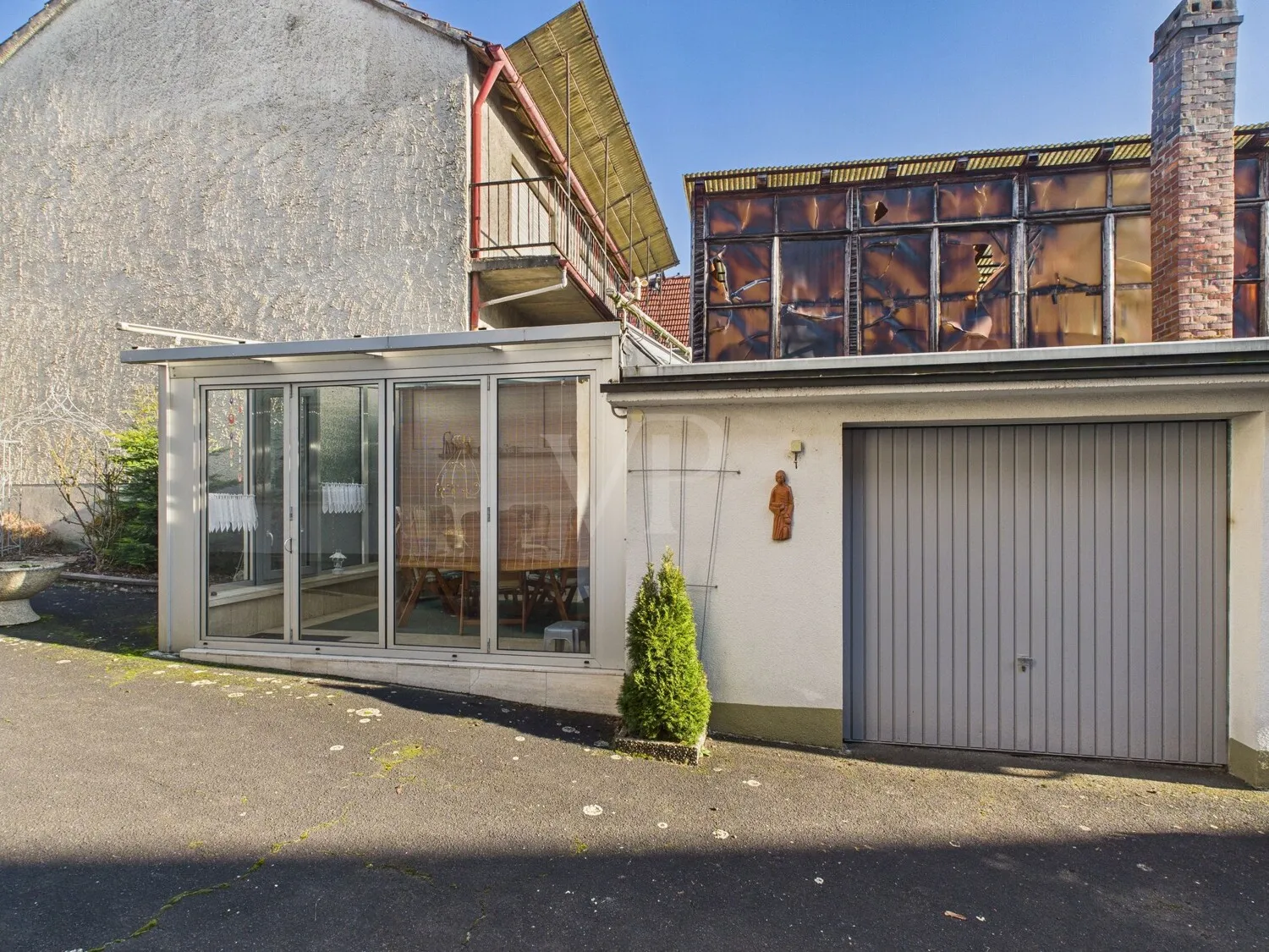 Wintergarten und Werkstatt