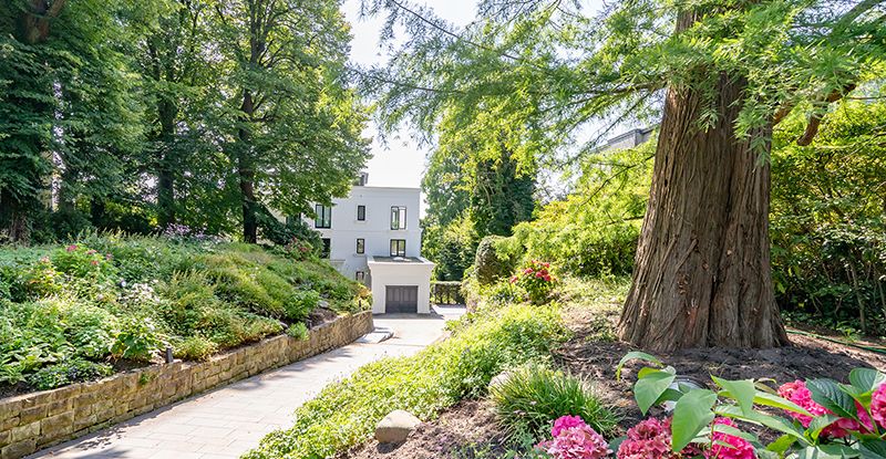 Beautiful private road leading to an exclusive apartment building