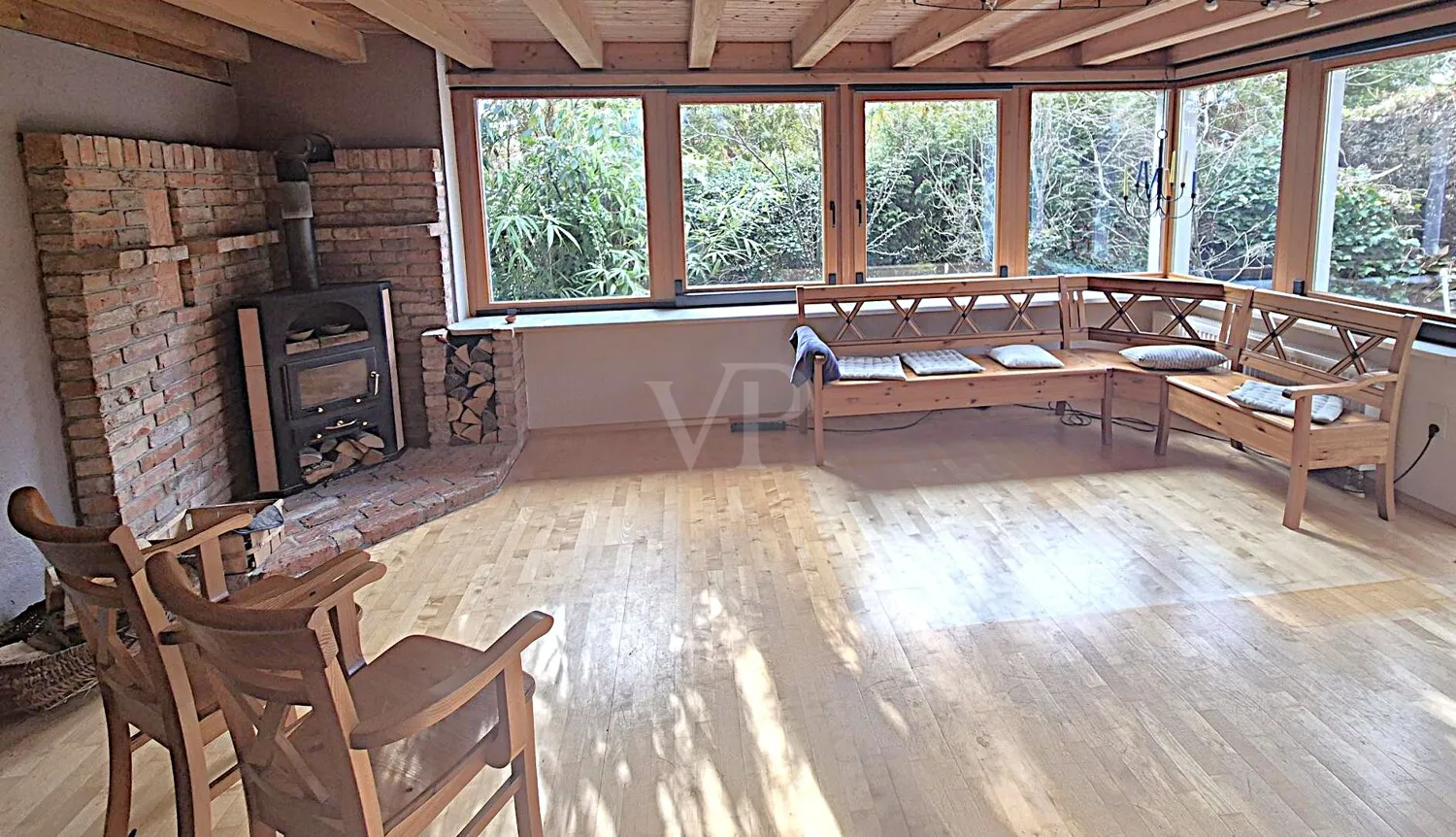 Wintergarten mit Kamin