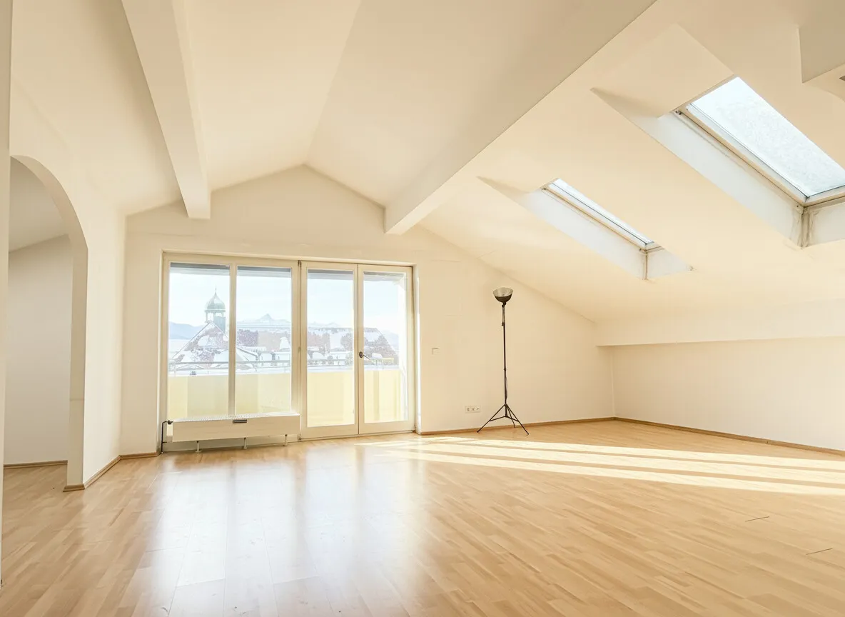 Außergewöhnliche Dachgeschosswohnung in zentraler Lage mit Bergpanorama