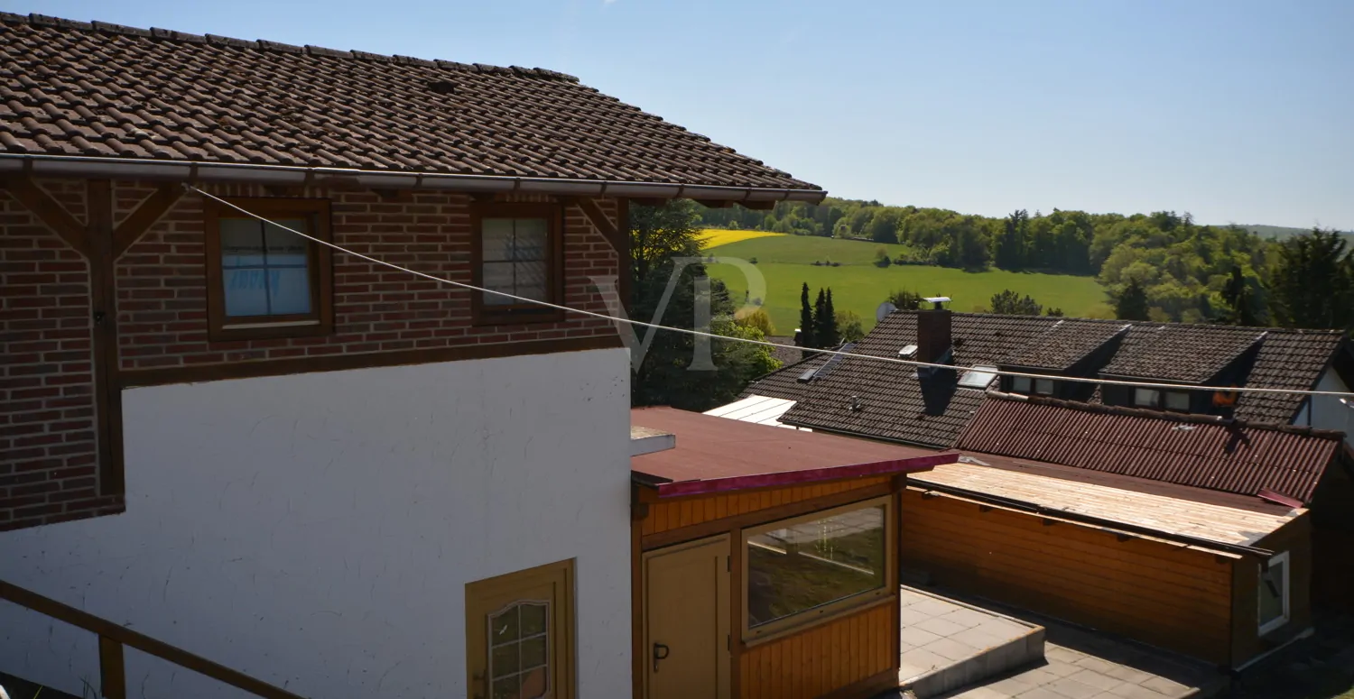 Unterkellerte Garage mit Wochenendhaus