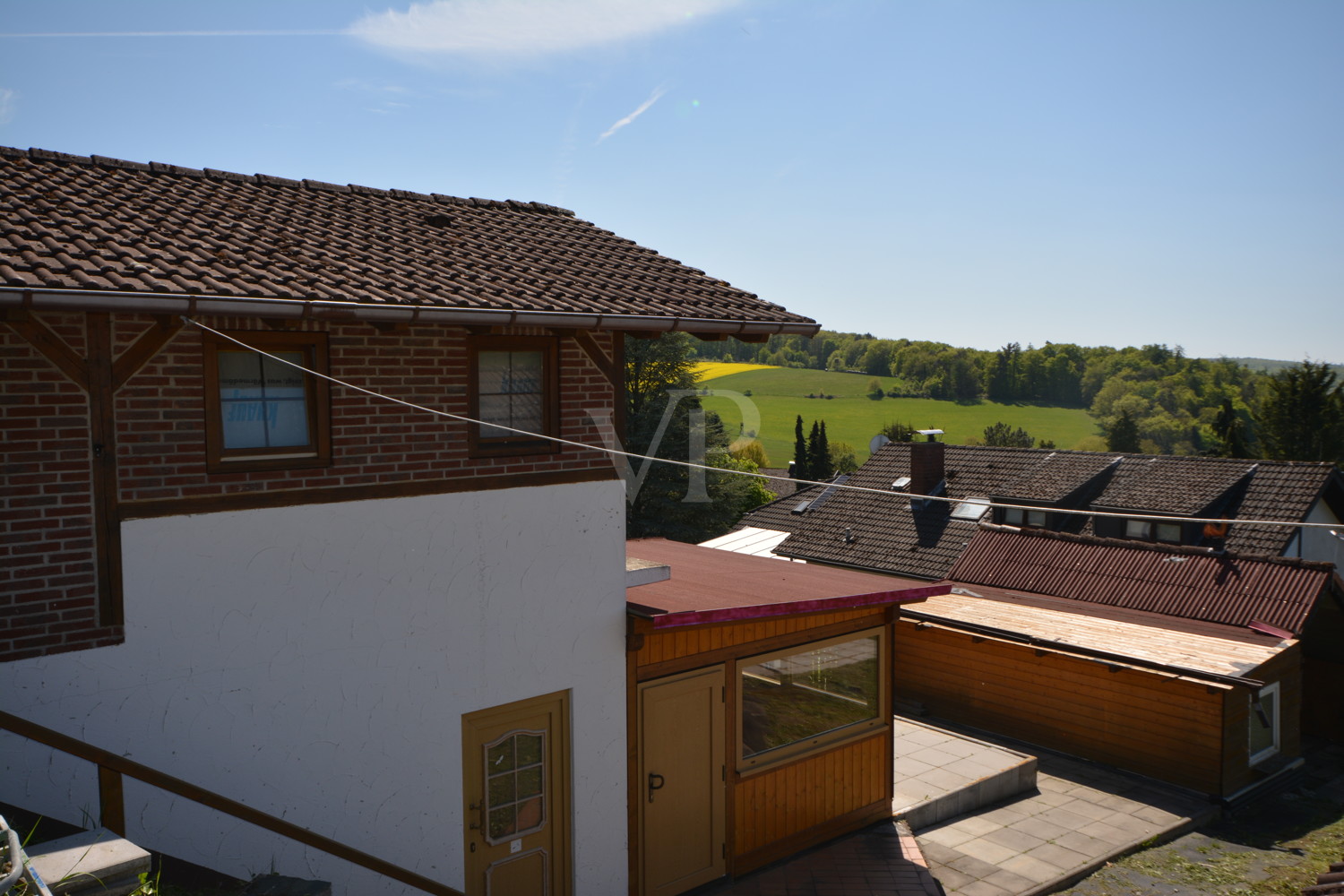 Unterkellerte Garage mit Wochenendhaus