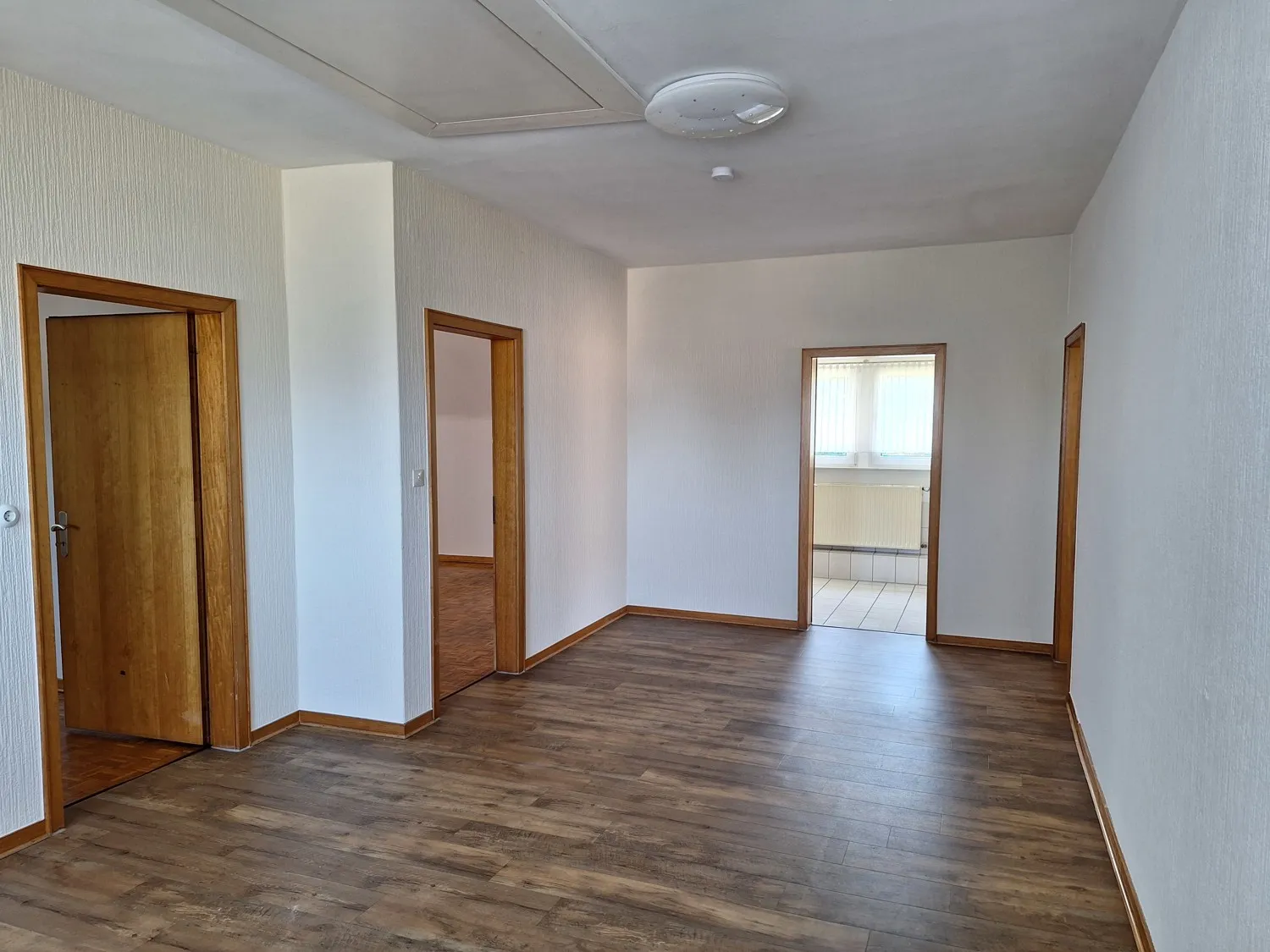 Modernisierte Dachgeschosswohnung mit sonniger Terrasse in Langwege