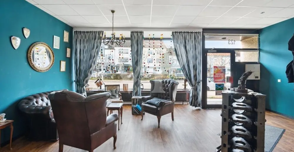 Vermietete Gewerbefläche Erdgeschoss