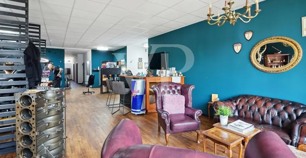 Vermietete Gewerbefläche Erdgeschoss