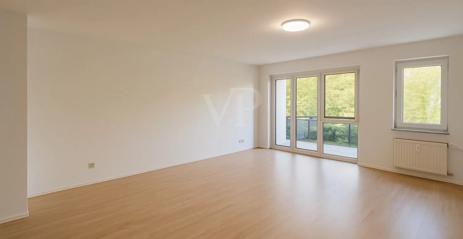 Lichtdurchflutete Erbpachtwohnung mit Balkon und Tiefgaragenstellplatz