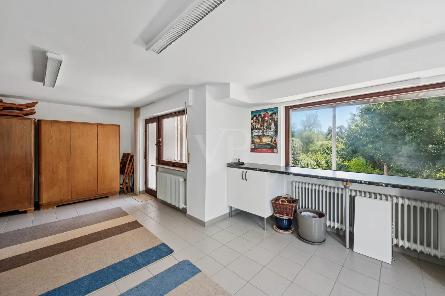 Zimmer im Hanggeschoss mit Terrasse