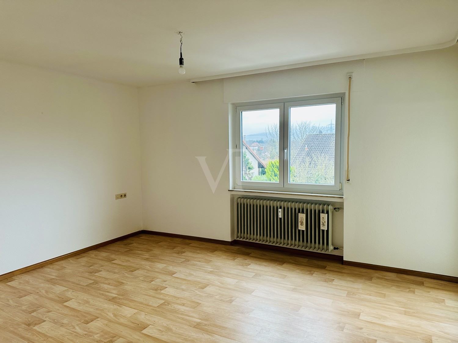 Schlafzimmer mit Zugang zum Balkon