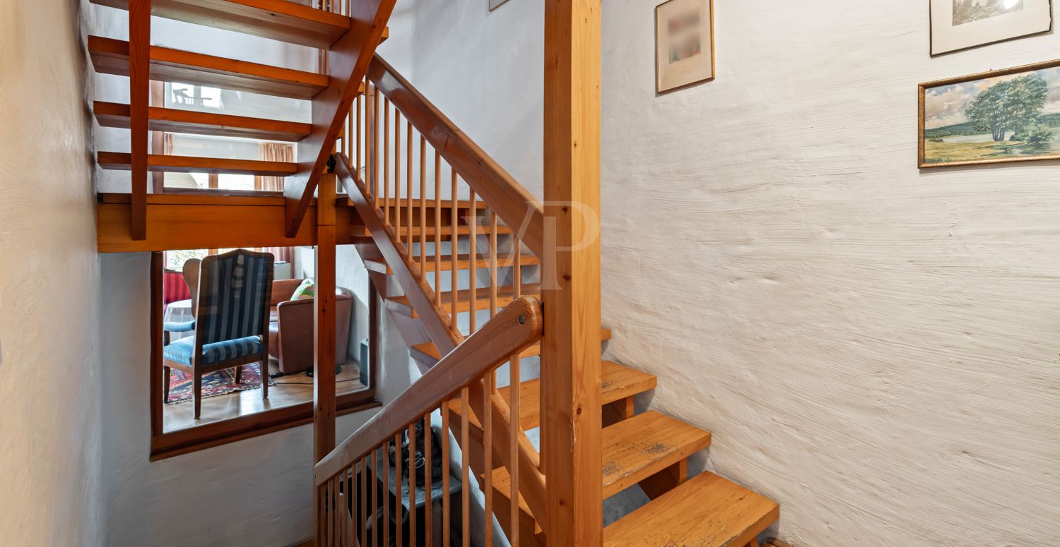 Treppenhaus mit Glaselementen für Tageslicht