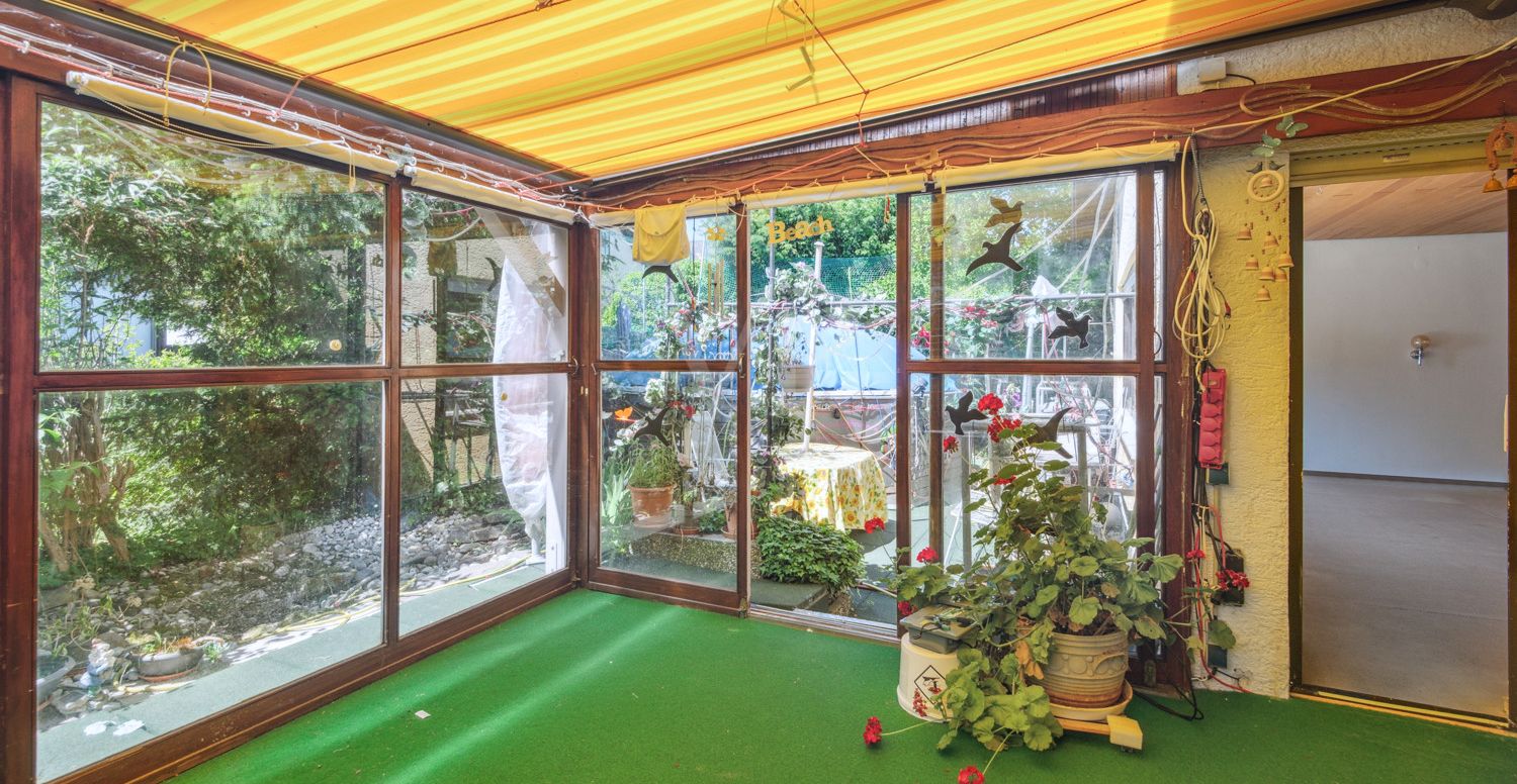 Wintergarten mit Gartenzugang