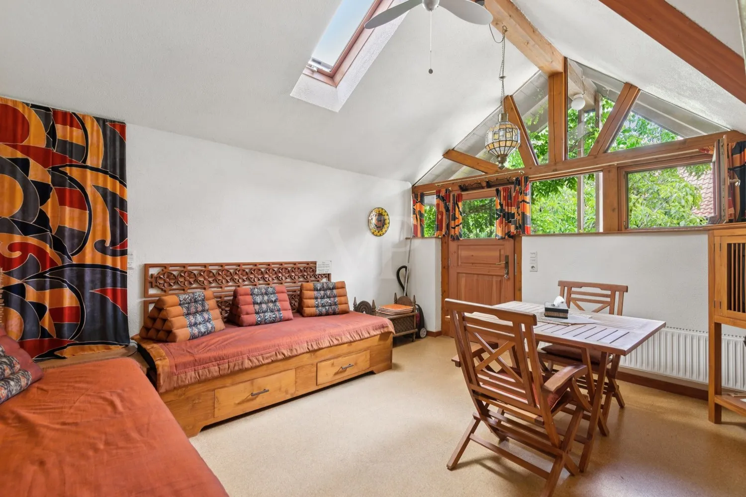 Ess- und Wohnbereich Dachapartment