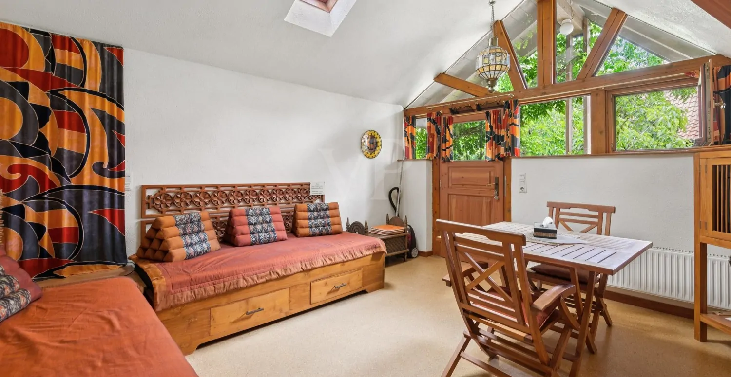 Ess- und Wohnbereich Dachapartment