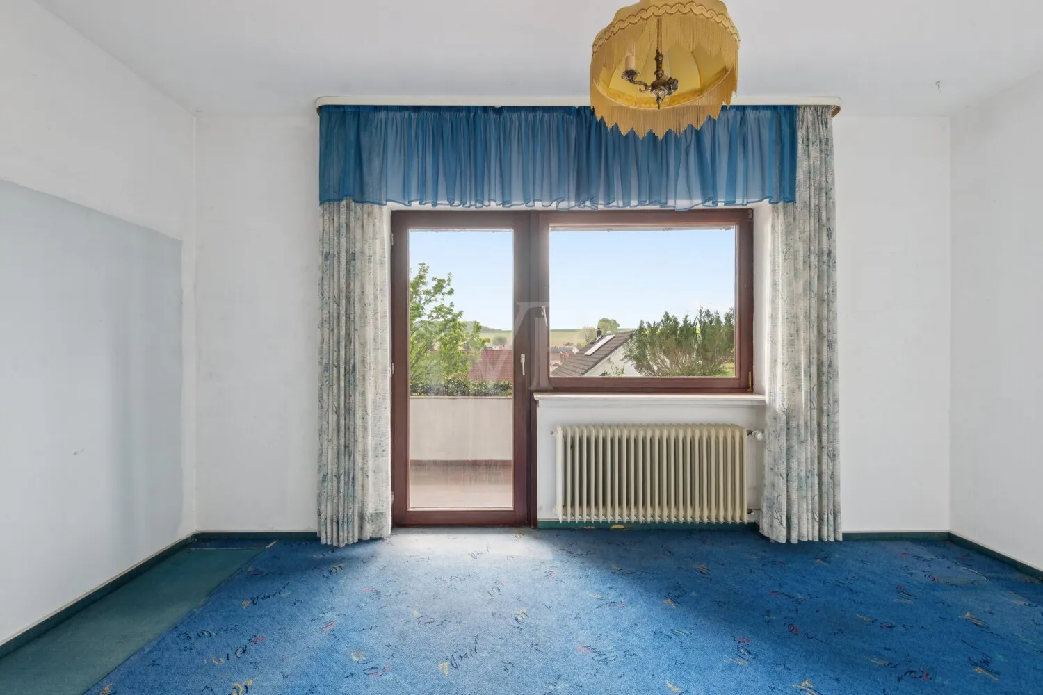 Schlafzimmer mit Balkon