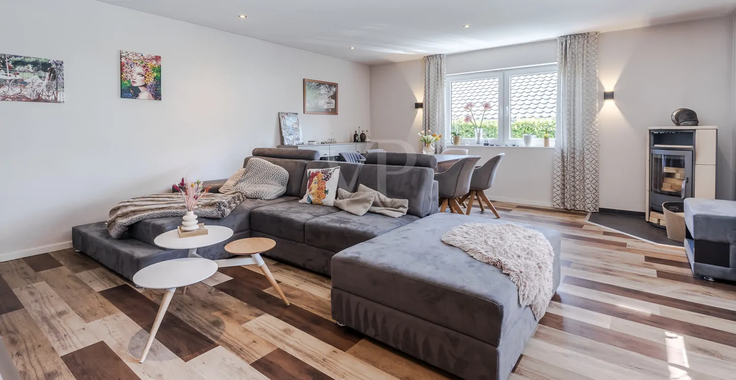 Wohnzimmer mit gemütlichem Kaminofen