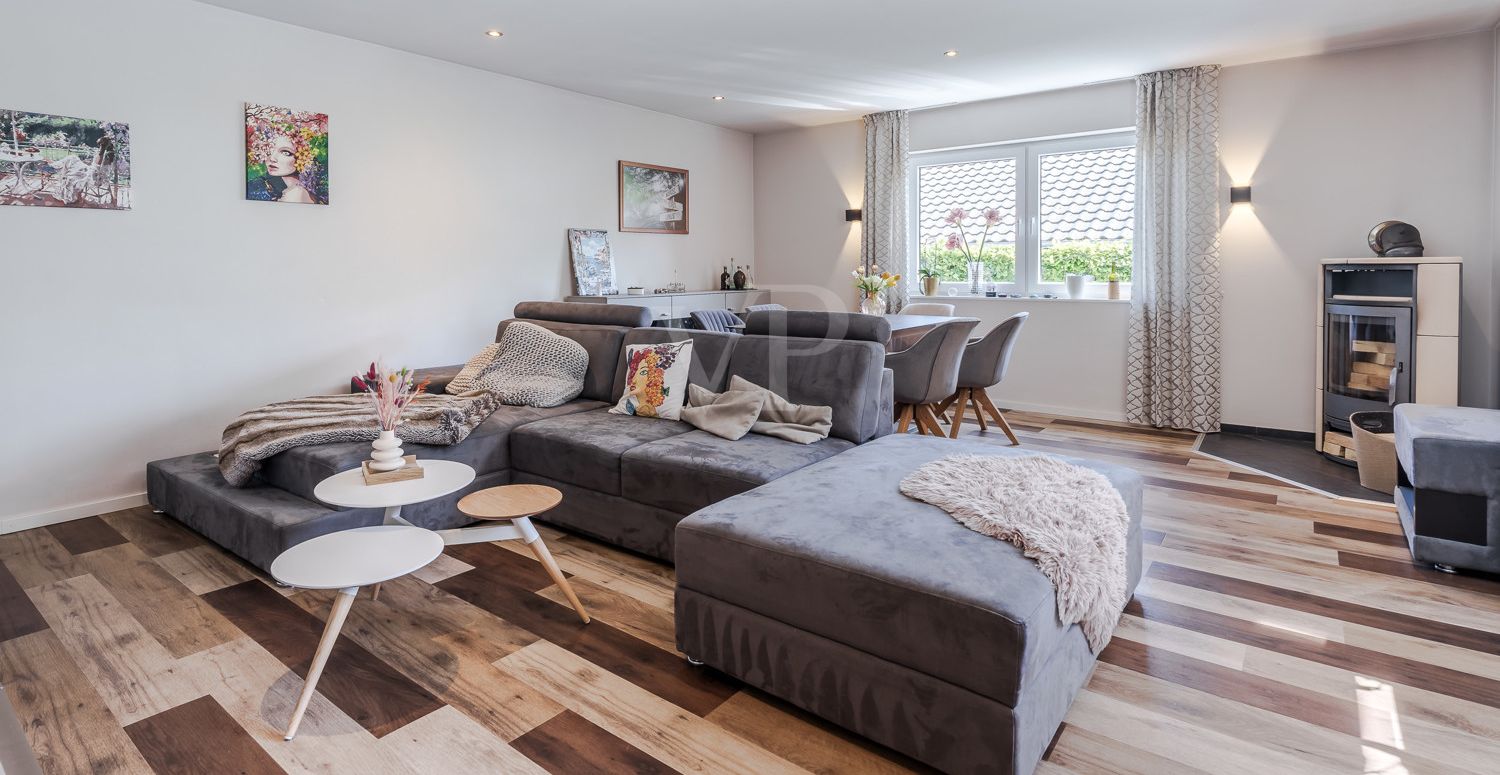 Wohnzimmer mit gemütlichem Kaminofen
