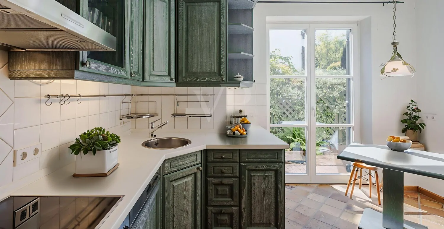 Küche mit Zugang zum Garten im gartenseitigen Haus