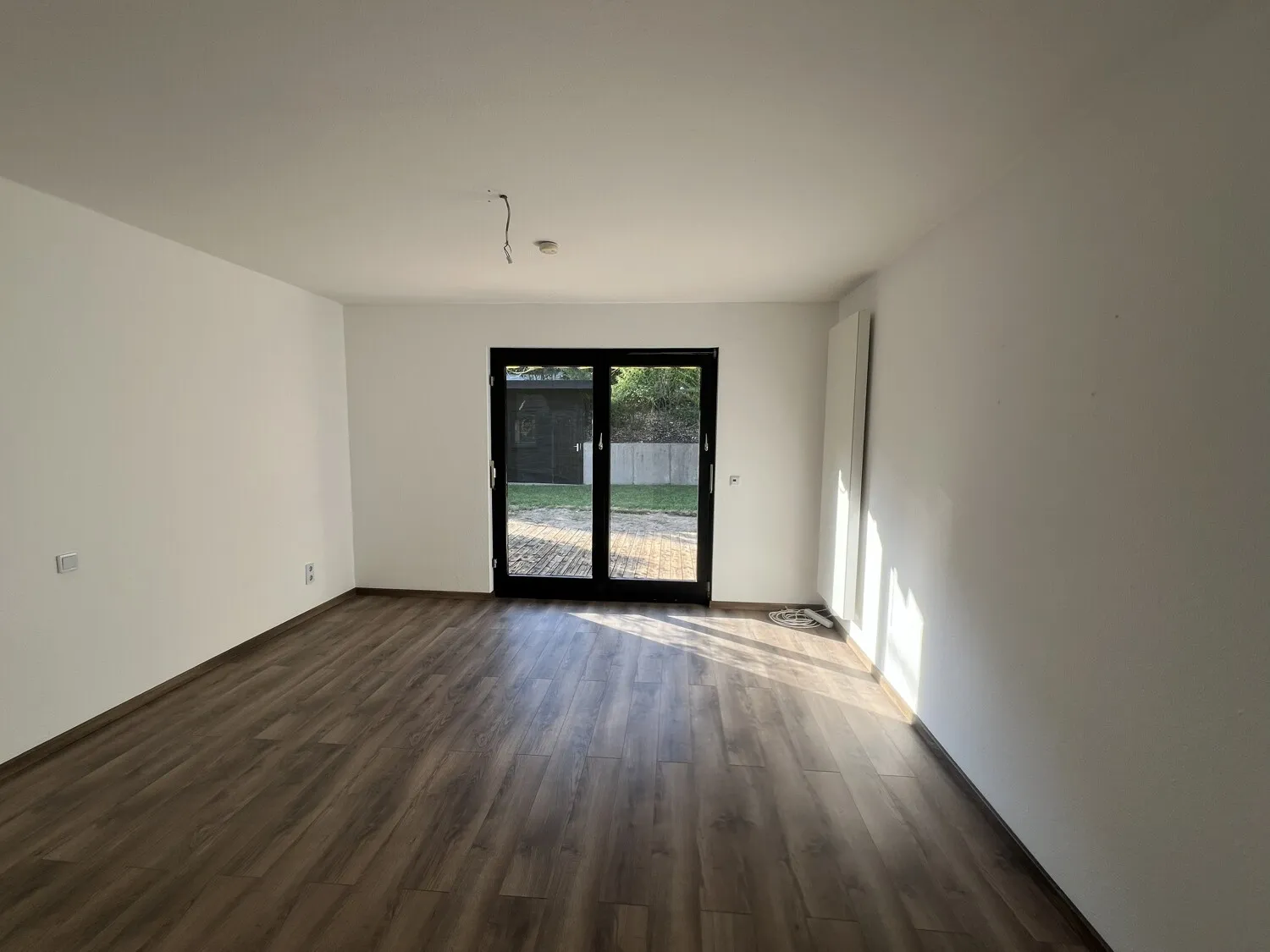 Hauptschlafzimmer mit Zugang zum Garten