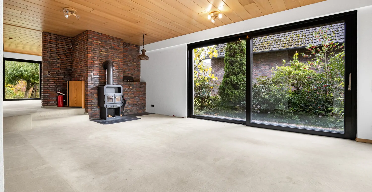 Wohnzimmer mit Kamin