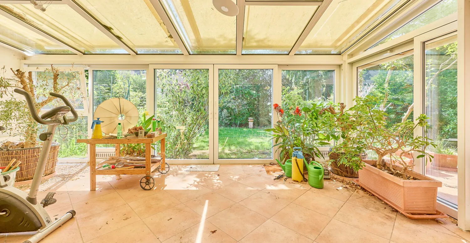 Wintergarten mit Zugang zum Garten