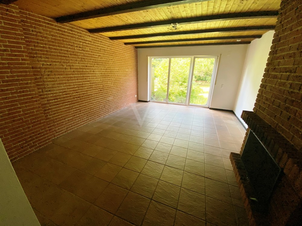 Wohnzimmer mit Kamin