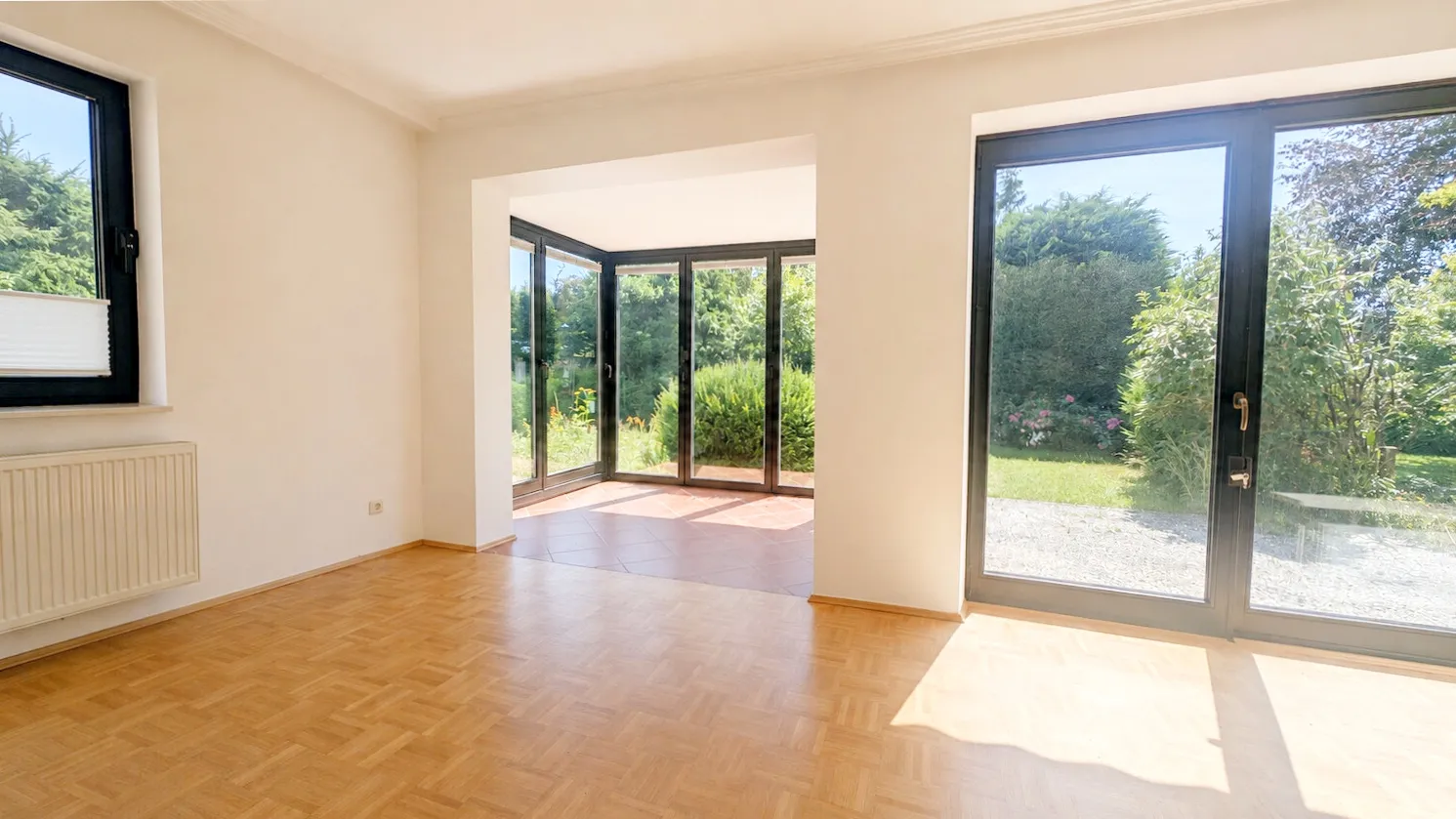 Wohnzimmer mit Wintergarten DHH Boye