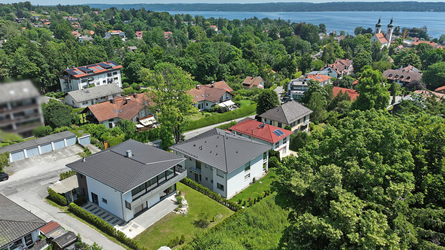 Moderne Villa mit See und Alpenpanorama
