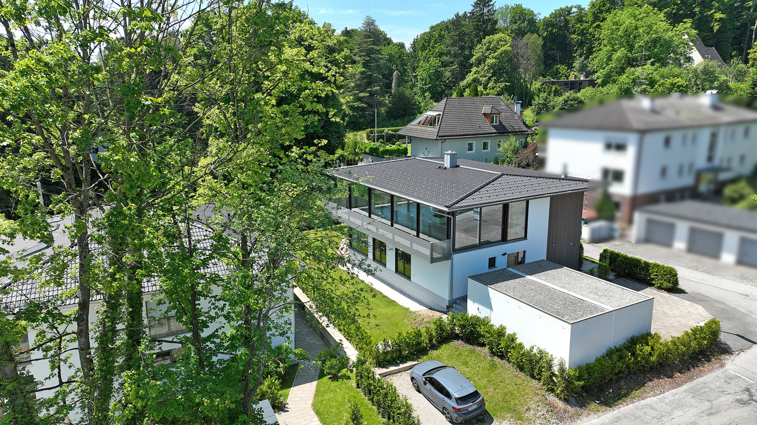 Moderne Villa mit See und Alpenpanorama