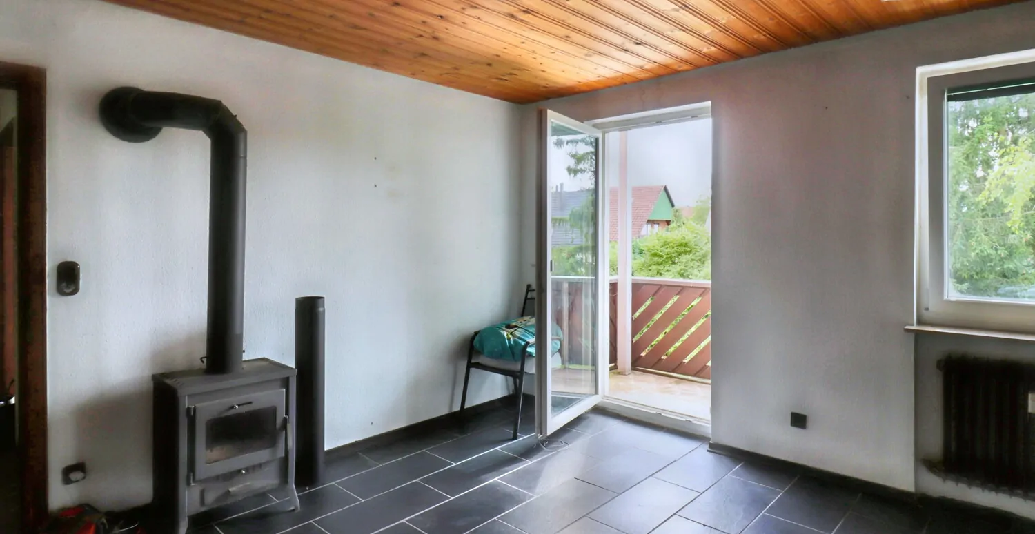 Wohnzimmer mit Kamin