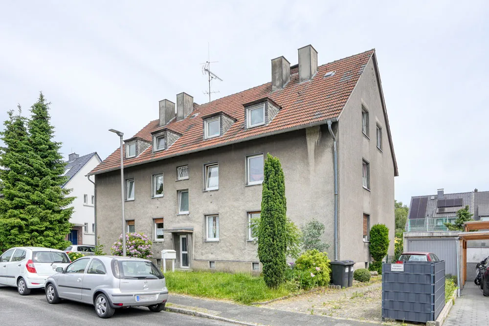 Solid multi-family house with two garages